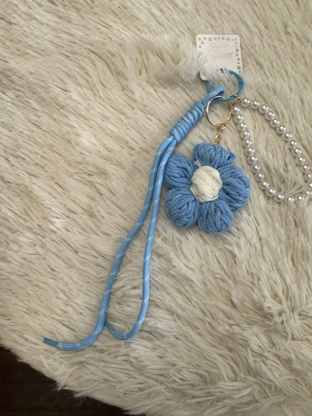 Blue flower keychain bag phone charm with white center and pearls